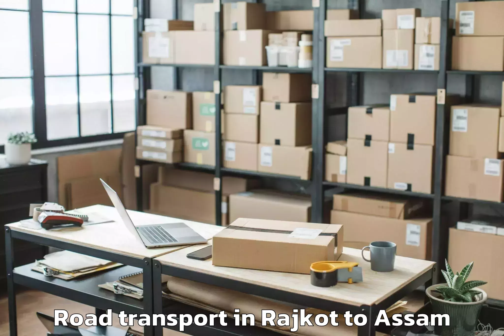 Professional Rajkot to Nowgong Road Transport